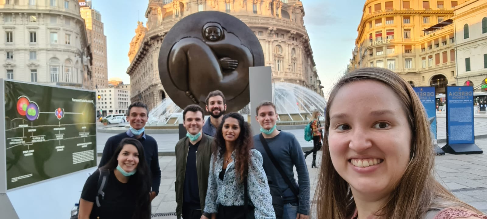 Participants and lecturer in at The Code of the Universe exhibition at the Piazza De Ferrari in Genoa.